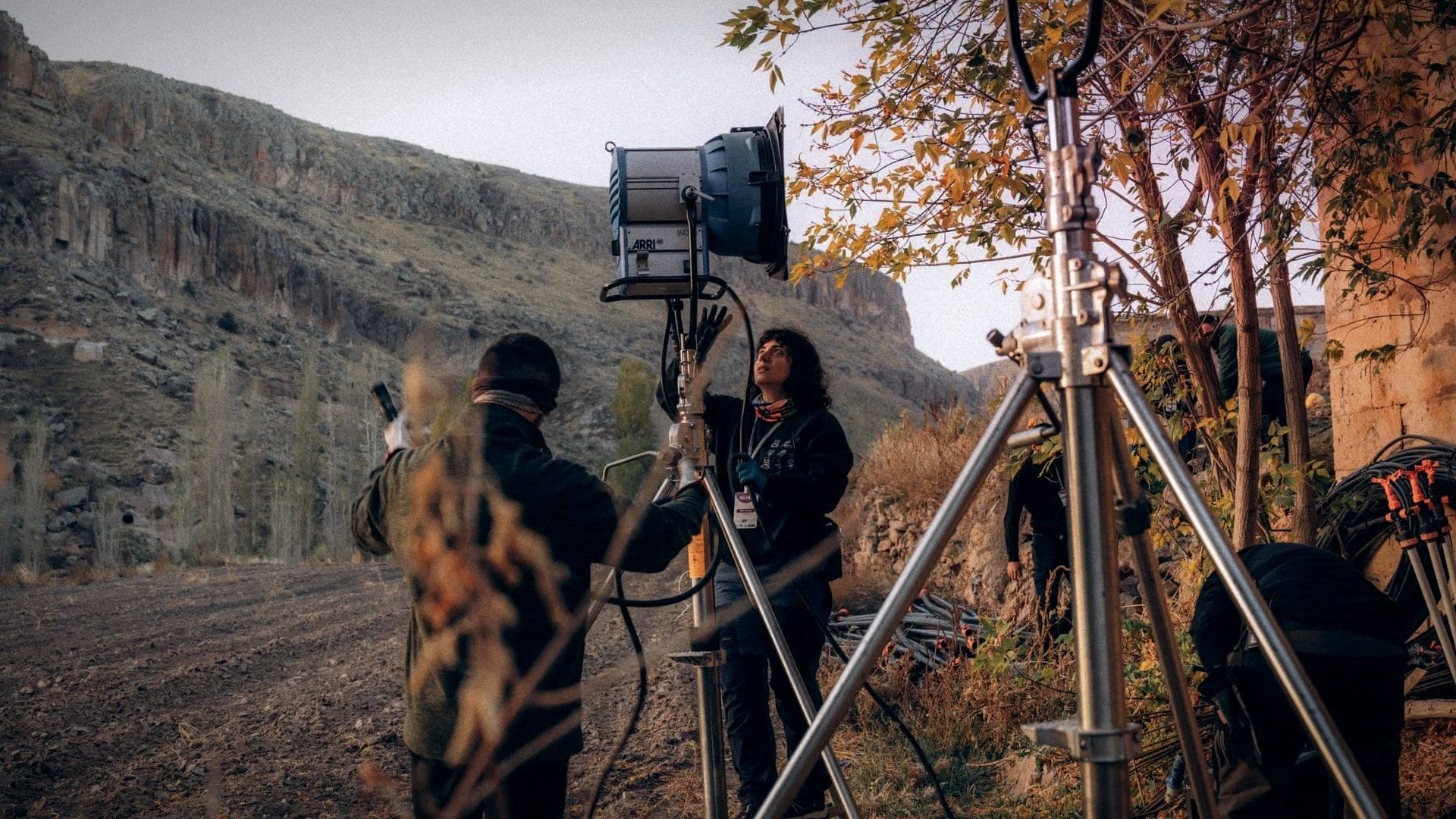 A Watchdog Media crew sets up a light on location in the KwaZulu-Natal landscape.